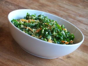 kale quinoa salad with lemon garlic dressing and cranberries.